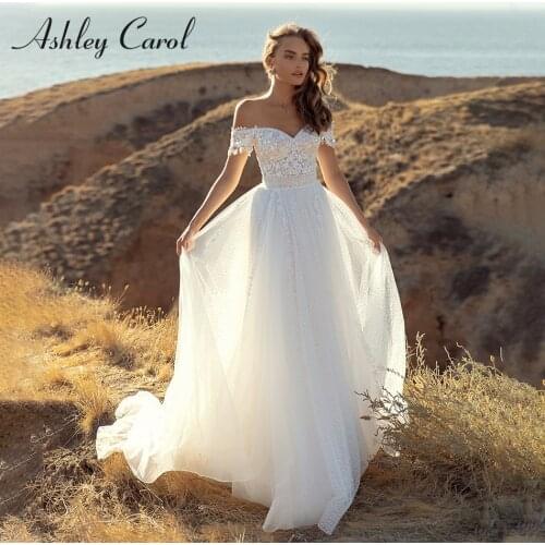 Ashley Carol A-Line Wedding Dress 2021 Classy Beaded Sequined Appliques Off the Shoulder Bride Backless Flowy Beach Bridal Gown