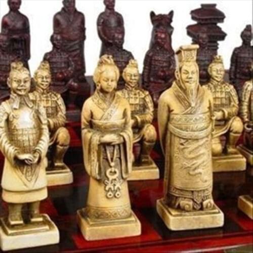 A SET OF EXQUISITE CHINESE 32 PIECES TERRA-COTTA WARRIORS STATUE CHESS WITH ANTIQUE DRAGON PHOENIX BOX