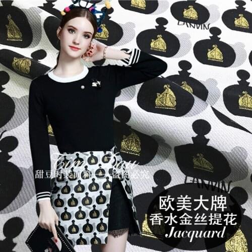 New 140cm wide gold perfume bottle jacquard fashion fabric windbreaker dress skirt fabric brocade fabric cotton fabric