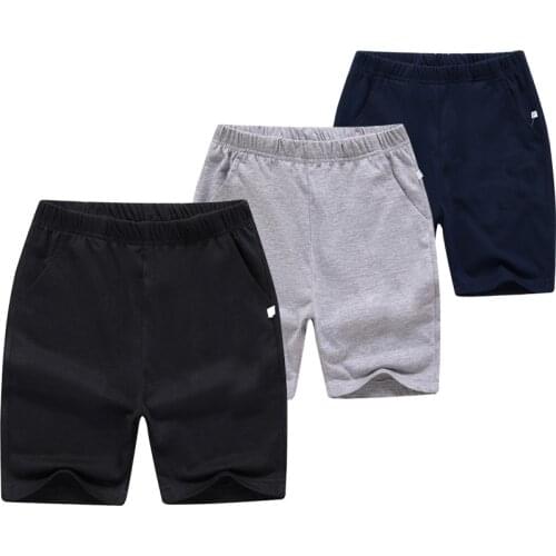 Childrens clothing childrens casual boy shorts solid color student sports pants