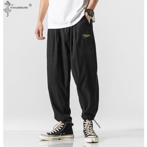 YI NA SHENG WU Men's Pants With Motney