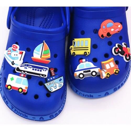 1Pcs Ship High-speed rail Motorcycle Steamship Shoe Charms Cartoon Figure DIY Kids Wristband PVC Kids X-mas Gift