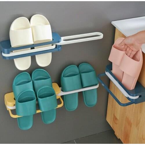 The bathroom does not have holes and covers an area of foldable wall hanging storage magic slippers shelf J05
