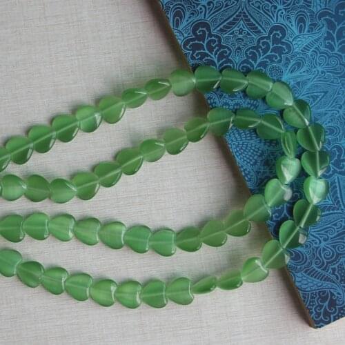 About 4.5x12x12mm puffed heart cats eye glass beads,About 1.0mm in hole size,33 pieces per lot,factory price