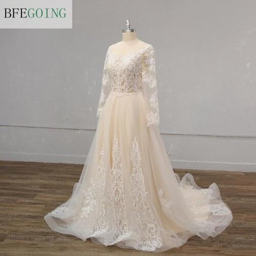 Champagne Tulle Ivory Lace Beading Appliques Long Sleeves Bridal gown Floor-Length A-line Wedding dress Chapel Train Custom made