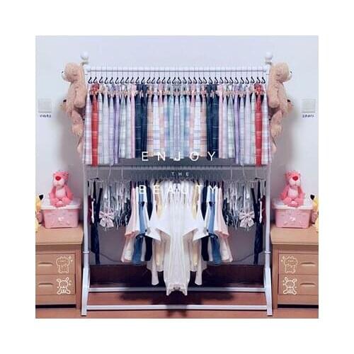 Womens clothing store display rack floor childrens clothing store shelf iron display rack JK uniform grid skirt double hanger
