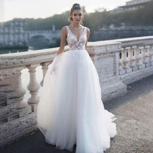 Sexy V Neck Wedding Dresses Appliqued Lace A Line Sleeveless Wedding Gown Backless Bridal Gowns Floor Length Vestido de Noiva