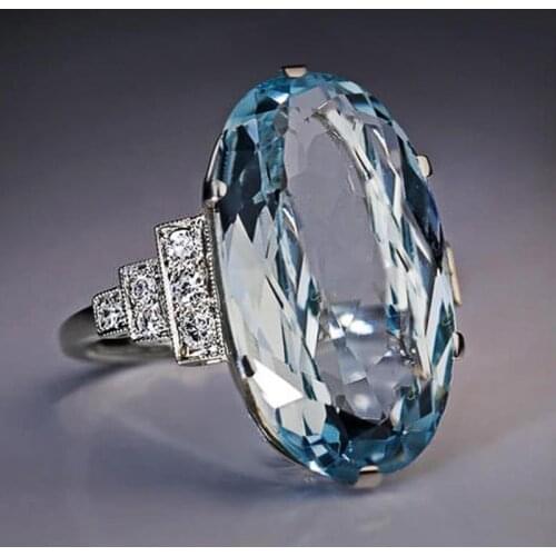 Huitan Female Light Sky Blue Wedding Ring Solitaire Band Oval Stone Engage Party Women Luxury Jewelry Shine CZ Stone Best Gift