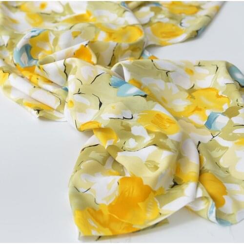 One meter High quality artificial cotton tissu Yellow flower printing patchwork Childrens pajamas and skirts material