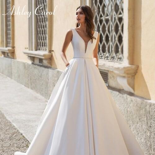 Ashley Carol A-Line Wedding Dress 2021 Satin Sexy Backless Beaded V-Neck Sashes Sleeveless Princess Bridal Gown Vestido De Noiva