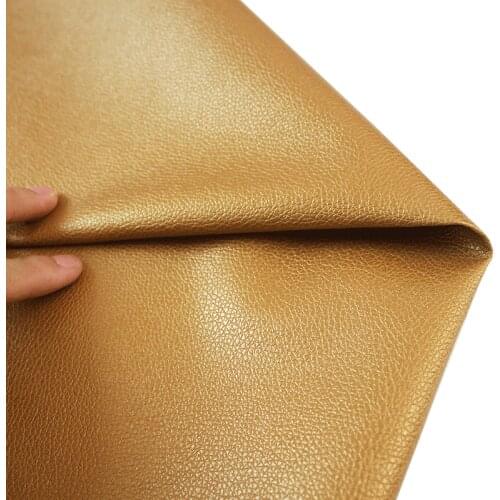 Bright gold PU leather fabric small litchi pattern imitation leather sofa car soft bag hard Bag Handmade fabic 50x140cm