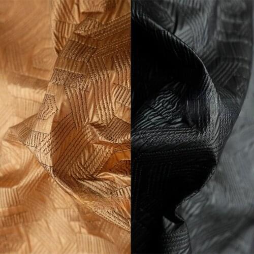 Calendered and pleated metal feeling hexagonal stiff jacquard fabric suit windbreaker pv feeling small jacket fabric