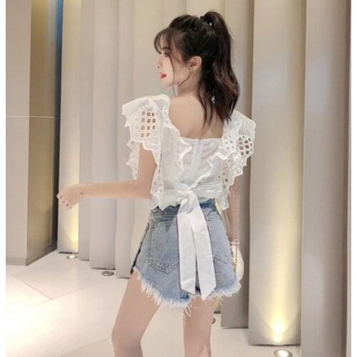 New 2019 Summer 2 Piece Set Vintage Sexy Backless Lace Up Tops Women Hollow out Patchwork White Blouse+Tassel Denim Shorts Suits