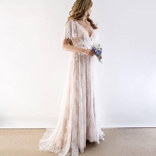 Sexy Backless Beach Wedding Dress 2020 V Neck Cap Sleeve Lace Boho Wedding Gown Custom Made A-Line Bridal Dress vestido de noiva