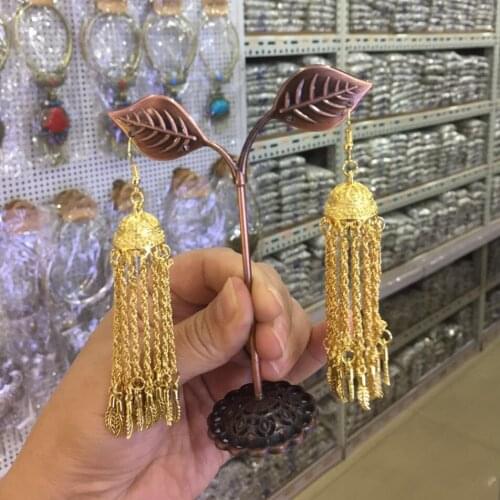 Bohemia type golden metal pattern cap attach golden chain tassel with leaf tail bead charms long dangle earring for women