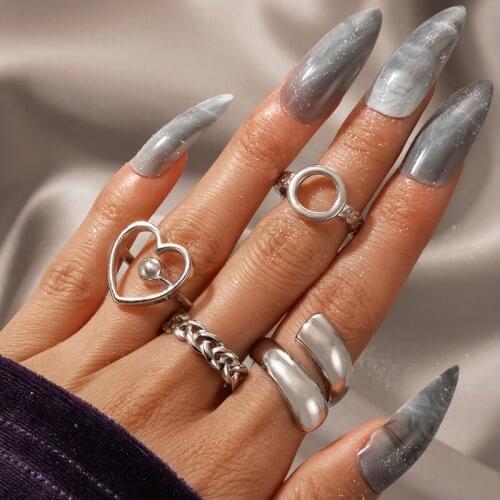 HuaTang 4pcs/set Punk Hollow Circle Heart Rings Sets for Women Silver Color Hip Hop Knuckle Rings Party Jewelry Pendiente
