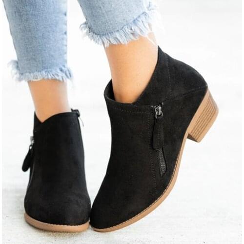 Womens winter ankle boots with low heels in solid color suede