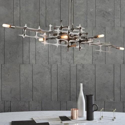 Postmodern chandelier designer stainless steel creative model room decoration lamp Hong Kong style light luxury restaurant