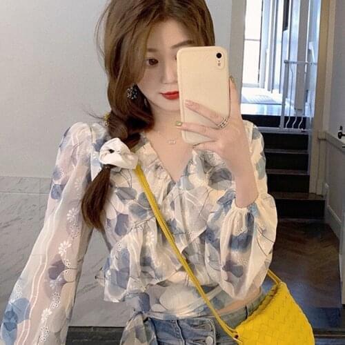 Leaf sweet Lotus chiffon shirt spring 2021 new womens noble foreign style small shirt broken flower V-neck transparent yarn top