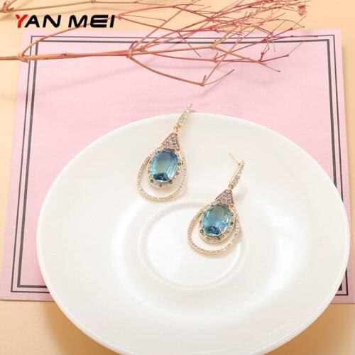 YANMEI Hollow Fine Blue Water Drop Earrings Senior Ladies Jewelry Temperament Wild Earrings YME9518