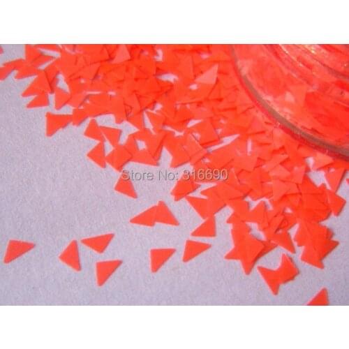 Neon Orange triangle glitter nail polish supplies