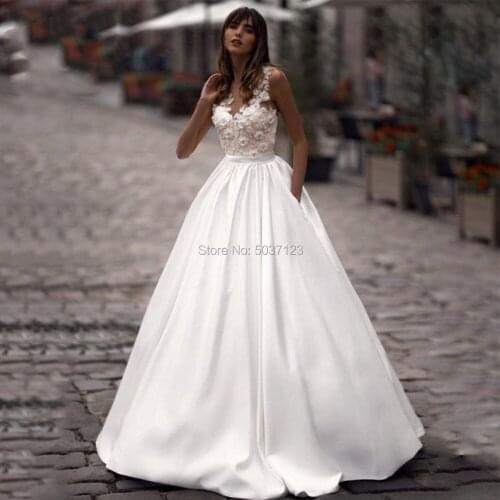 Elegant Satin Princess Wedding Dresses with 3D Lace Flowers Sexy V Neck Buttons Back Bridal Gown Vestido de novia with Pockets