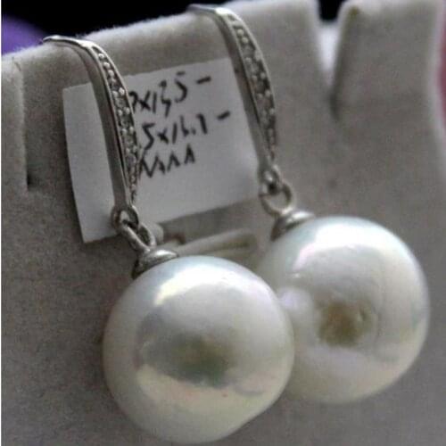Stunninga pair of 12-13mm natural round white pearl earring925s full drilled