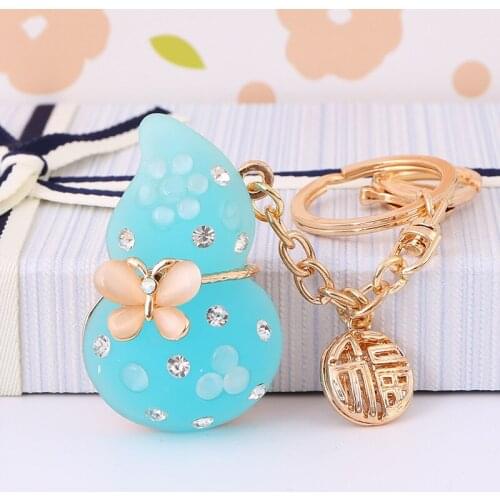 Factory direct supply gourd shape key chain metal bell key chain custom make keychain