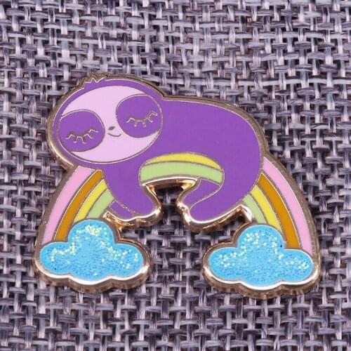 Rainbow Sloth Brooch What better place for this cute animal to take a nap than atop a rainbow