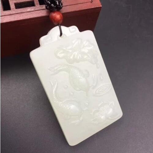 Natural Xinjiang Hetian white jade last year more than fish pendant 31 * 54 * 7mm with certificate