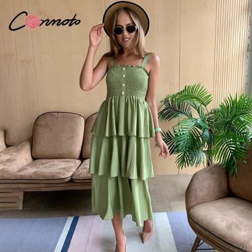 Conmoto flounce twist ruffles solid sexy long dress women twist backless summer cake dress casual beach holiday dress vestidos