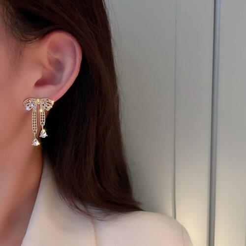 New personality creative hollow bow pendant earrings luxury fashion casual dance party earrings for women holiday gifts