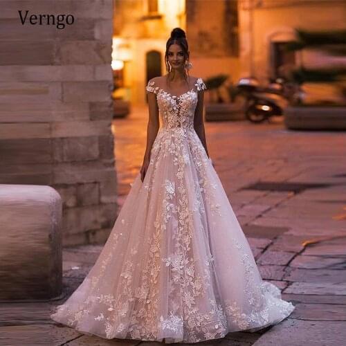 Verngo Delicate Lace Floral A Line Baby Pink Wedding Dress 2021 Sheer Neck Short Sleeves Back Buttons Glitter Tulle Bride Gowns