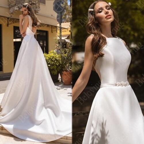 Sexy Backless Boho Wedding Dresses 2021 Robe de Mariee Vintage New Satin Sleeveless Bridal Dress Beach Wedding Gown With Pocket