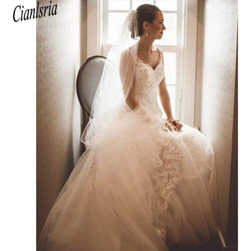 2021 A-Line Backless Wedding Dress Lace Beaded Spaghetti Straps Bride Dresses Elegent Floor Length Wedding Gowns