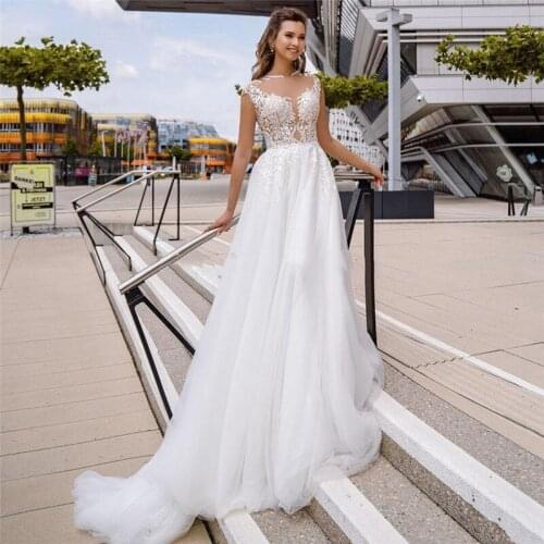 2021 Jewel Neck Tulle Lace Applique A Line Wedding Dress With Buttons Back Country Style Boho Bridal Gowns Formal Robe De Mariee