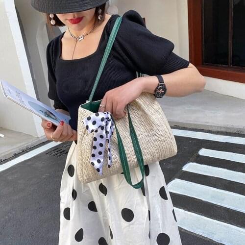 2021 new one-shoulder straw woven beach bag large capacity simple woven portable bucket bag