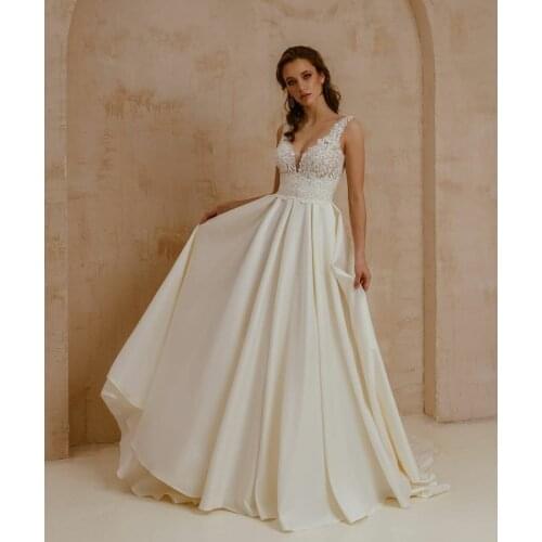 Elegant Long V-Neck Lace Wedding Dresses with Pockets A-Line Satin Court Train Corset Back Robes De Mariée Bridal Gown For Women