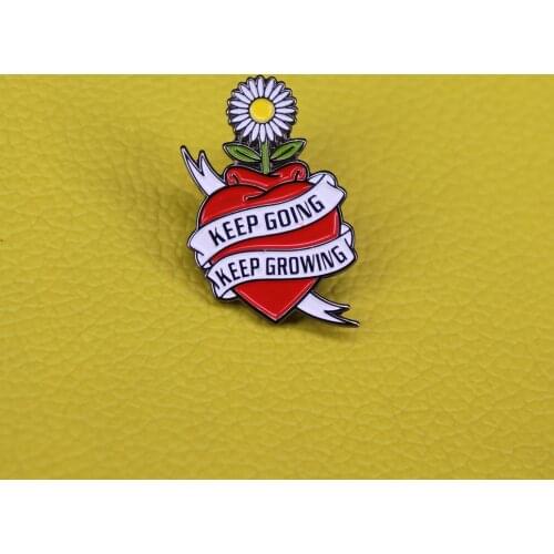 Keep going keep growing sunflower red heart enamel pin a daisy growing out of a heart brooch positive pins motivational recovery