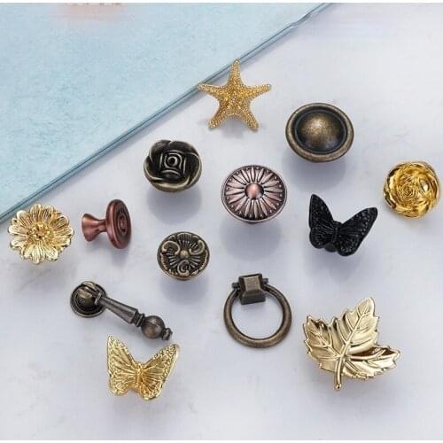 Single-hole drawer handle butterfly leaf rings furniture handle retro gold cabinet door and round knobs knurled handle slides