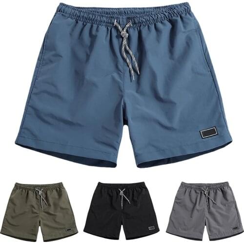 Men Casual Breathable Quick Dry Pants Pockets Beach Solid Color Sport Shorts