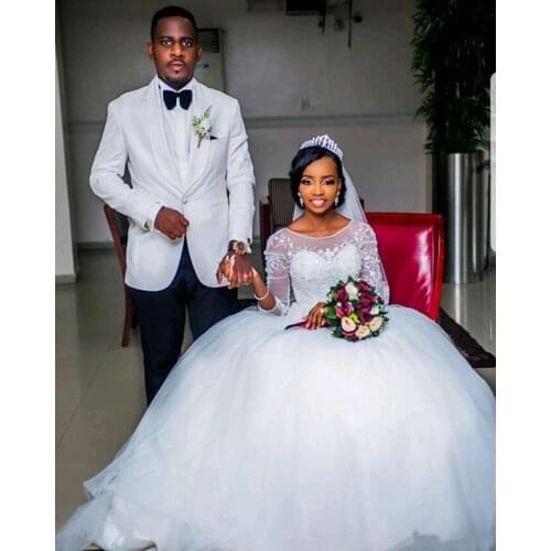 African 2023 Ball Gown Wedding Dresses Beads Lace Applique Long Sleeves Backless Bridal Gowns robe de mariée Wedding Dress