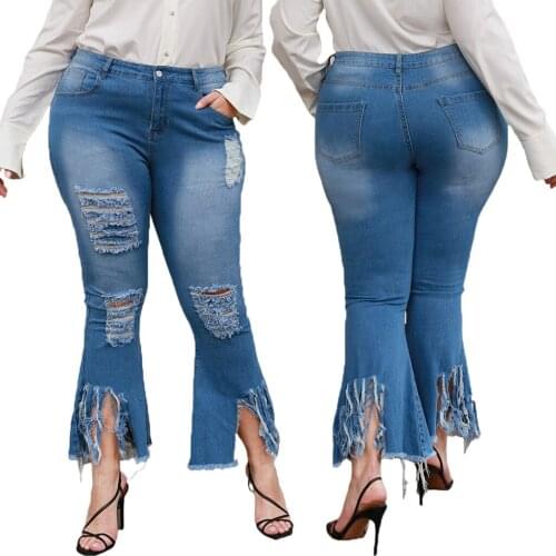 European and American plus size womens fat MM fashion wild personality ripped tassel stretch mother jeans flared pants