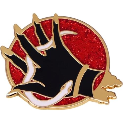 A Snake in Hand Enamel Pin Brooch