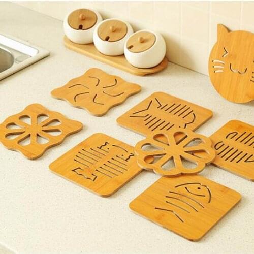 100pcs/lot Hollow wooden coasters Kitchen and thicken the hot heat eat mat antiskid pot pad bowl plate Mats