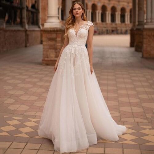 Bohemia Wedding Dresses 2020 Cap Sleeve Lace Appliques Bridal Gowns Scoop Neck Elegant Wedding Gowns Robe De Mariee