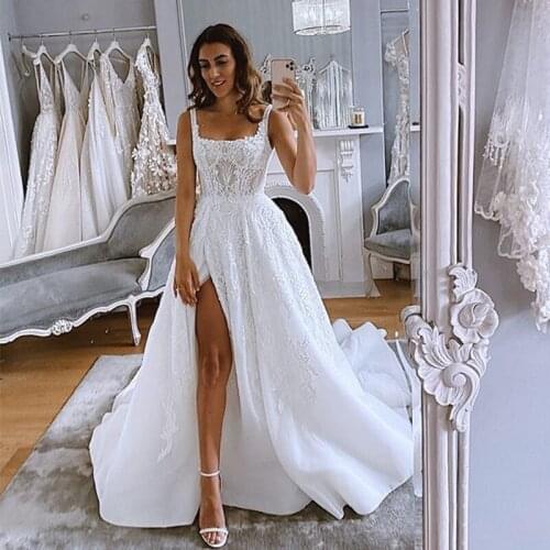 2020 Sexy Low Cut Lace Beads Tank Top High Split A Line Court Train Beach Party Wedding Dresses