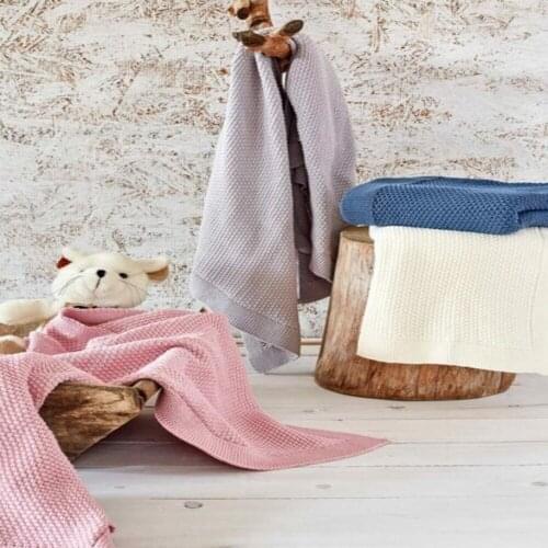 Baby Smile Blanket 100% Cotton Baby Knitted Blanket Made of knitted fabric, our product is very soft and keeps warm