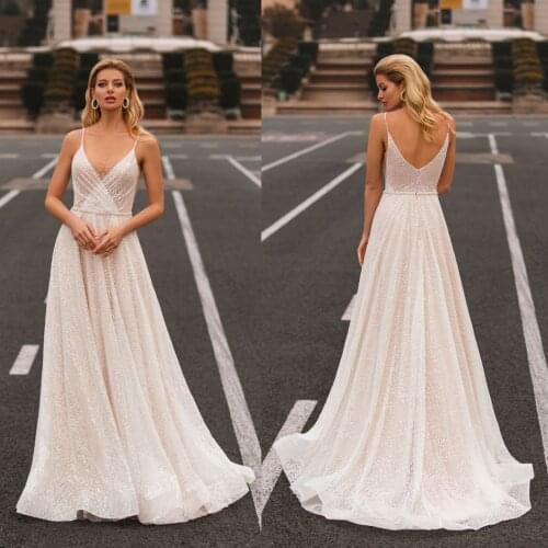 New Wedding Dresses Spaghetti Straps Lace Appliques Sequins A Line Bridal Gowns Custom Made Backless Sweep Train Wedding Dress