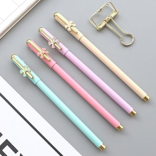 TUTU Colorful metal Gel Pen Starry Pattern Cute lovely bowknot Roller Ball Pens Stationery Office School Supplies H0205